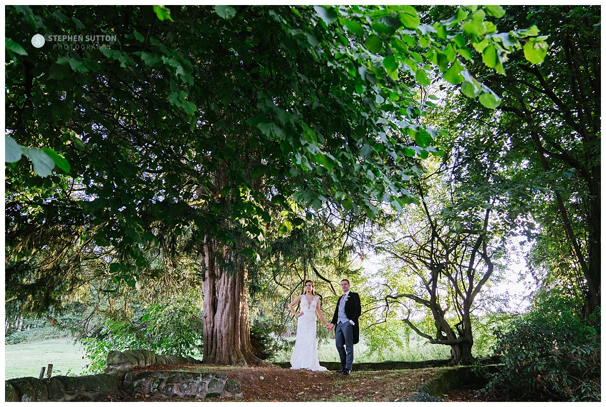 Bride and Groom in the gardens at Weston Hall
