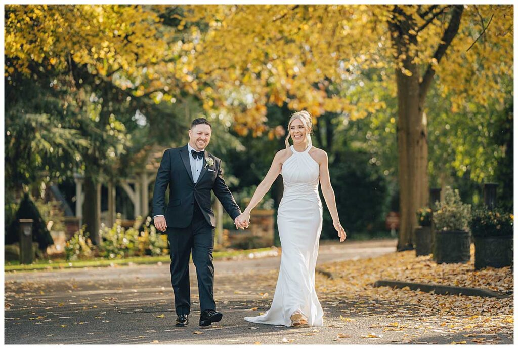 Bride and groom autumn wedding portraits
