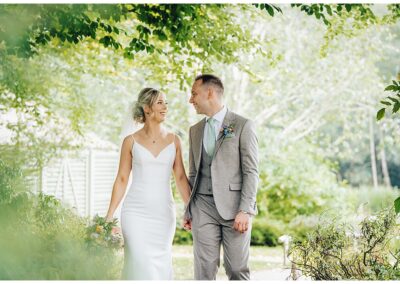 bride and groom in the gardens at Moddershall Oaks