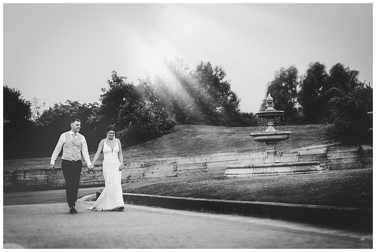 Couple walking in the grounds at Aston Marina