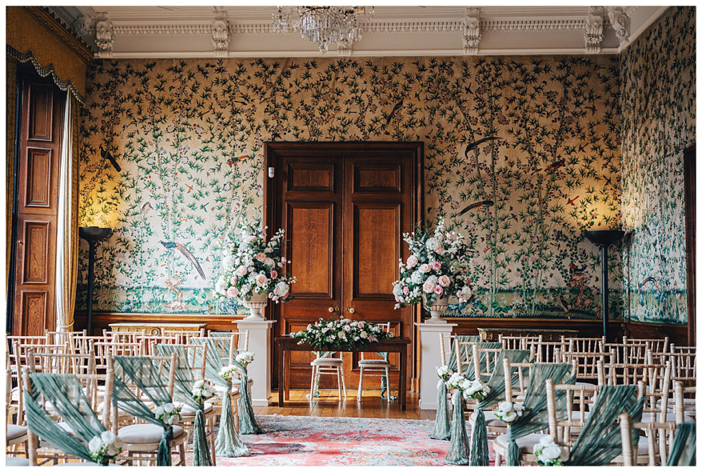 Wedding flowers inside Sandon Hall Drawing Room