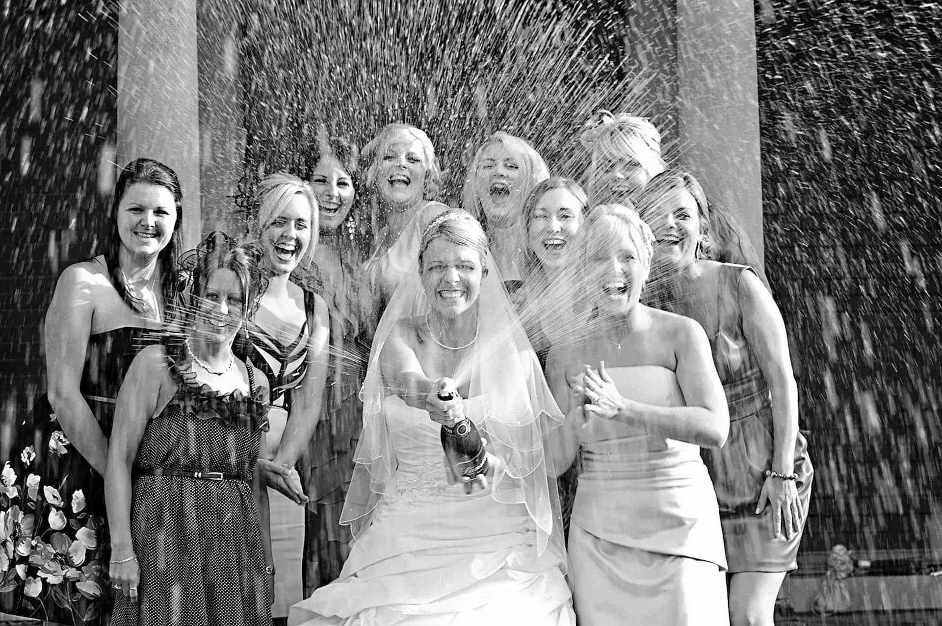 Bride with friends at Crewe Hall having fun