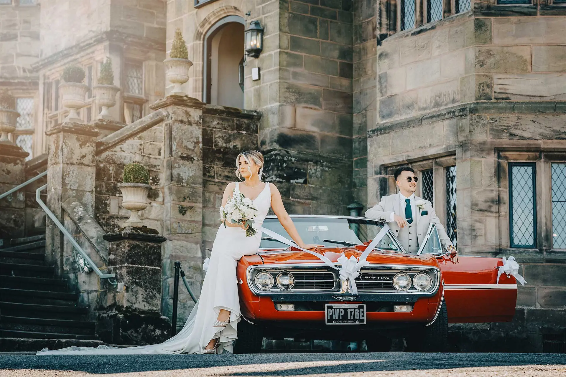 bride and groom outside Weston Hall in Stafford